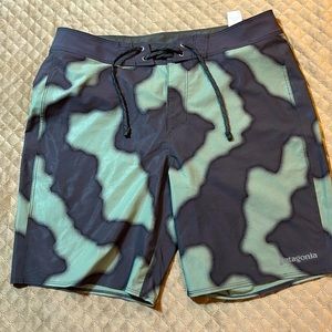 Patagonia hydro series board shorts size 30- 7 in green and black camouflage.